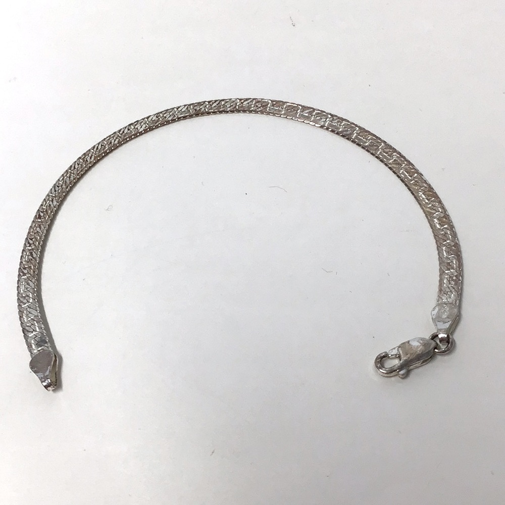 Elegant Silver Bracelet 925 reversible 
Shiny fine chain quiet luxury quality